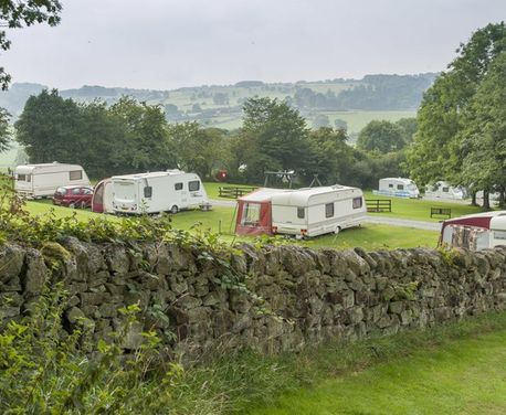 If you’re looking for peace, quiet and wonderful views teamed with walking and cycling, Bakewell Club campsite is for you. Its idyllic location near the pretty village of Youlgreave in the Peak District National Park offers a true back to nature camping experience. Campers report that the site’s minimum facilities are part of its appeal.

Bakewell campsite enjoys a peaceful, rural setting with stunning views over the Derbyshire countryside. The attractive site is excellently maintained and its 100 pitches are spacious, some benefit from the shelter of trees which dot the site. There’s also a small dog walk and a children's play area.