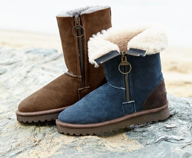 Chunky, ring-pull zips lend a fashion edge to our sheepskin boots. Do them up to show off the zip or fold them down to expose the contrast fleece. With rubber soles and suede heel protectors.

 	Height 22cm
 	100% premium quality British sheepskin
 	Sponge clean
 	Double stitched seams for improved strength
 	Shaved sheepskin heel back for improved shape retention
 	Durable high quality sole for comfort and support
 	Made in Great Britain
 	Available in: Khaki, Blue Iris & Black