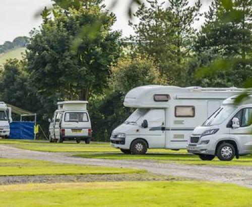 Enjoy glorious sunsets from your pitch at this Devonshire hilltop campsite.

Lynton Club campsite sits above the stunning Exmoor coast and is a stone’s throw from the genteel Victorian seaside resort of Lynton. This peaceful and secluded campsite is a rural heaven with beautiful views extending over the surrounding countryside and for some, panoramic views across to Wales.