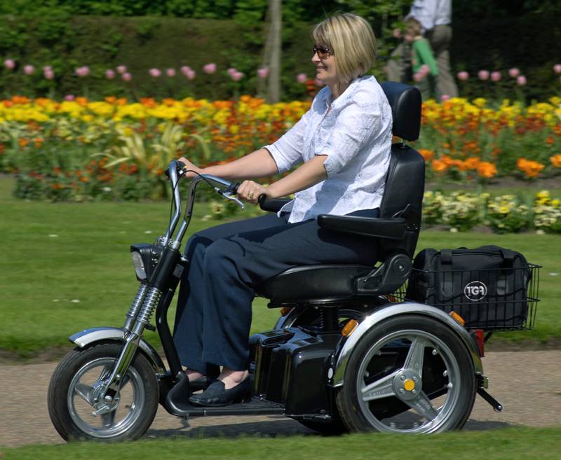 Known as the ‘Harley Davidson’ of mobility scooters the three-wheel black and chrome TGA Supersport delivers outstanding off-road performance. It is a popular choice of the Disabled Ramblers Association as many members rely on its proven reliability and stability when venturing across the country.
Ideal for coastal paths and rural tracks the Supersport provides superb manoeuvrability and assured traction – tackling slopes and rocky surfaces is no hassle at all. Drivers weighing up to 25 stone can enjoy day long comfort and with heavy duty batteries onboard, a 30 mile range is easily in reach.