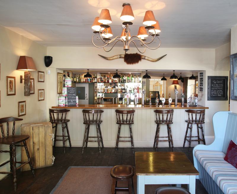 The Crown’s bar is a warm and inviting area with a roaring wood-burner for people to relax and warm themselves on the coldest of days.

Stocked with a wide range of local ales, premium spirits and a large selection of international wines.