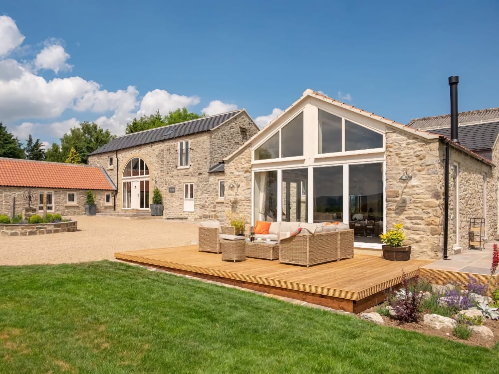 West Grange, our five-bedroom large lavish country house for family and friends in Leyburn, North Yorkshire. This luxury escape is a hot tub holiday home that promises chic interiors and rustic features, and is enough to make any special occasion truly unforgettable.
Guests can look forward to unwinding in front of the roaring log burner in the cosy living areas, luxuriating in the bubbling hot tub, or simply catching up around the outdoor fire pit. Fire up the BBQ or enjoy drinks before dinner, whilst admiring the far-reaching views of picturesque Yorkshire hills. Each of the five spacious bedrooms is uniquely designed, and with an en-suite bathroom.
Pub under 1 mile
Fantastic Views
Private Parking
More Accessible
Log Burner
Al Fresco Dining
Dog Friendly
Hot Tub