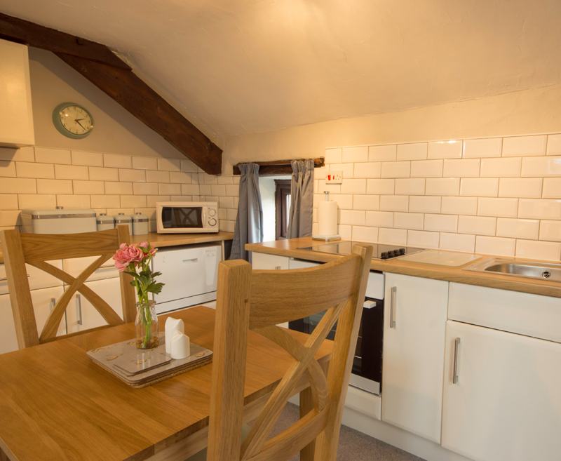 A small yet cosy first-floor cottage with an open plan kitchen, sitting room and dining room. Bluebell contains a double bedroom and en-suite shower room.

It is ideal for a couple or a single person looking for a week or short break away from the bustle of modern life. The cottage has a window view over the courtyard.

Occupancy: Maximum 2 adults - no children or babies
Dogs: 1 small/medium dog (to be used as a guide only – please contact us regarding individual requirements)