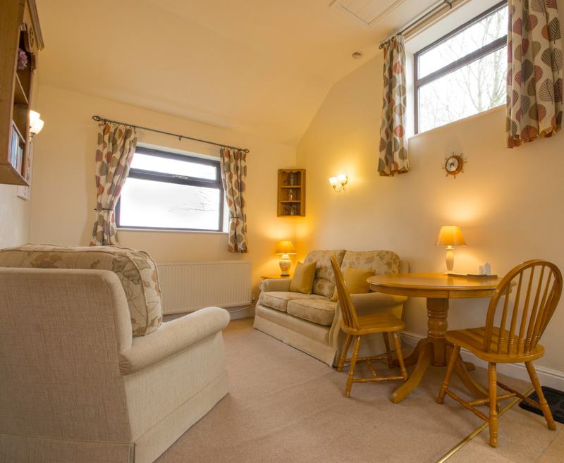 A spacious, airy, single storey barn conversion offering quality accommodation with magnificent views over open countryside.  The cottage contains an open plan living/dining and kitchen area.  The double bedroom has an en-suite bathroom which includes a bath and separate walk-in shower.

Dove is the perfect cottage to ‘take it easy’. It is ideal for a couple, or couple with a baby, looking for a relaxing, tranquil week or short break away from the hustle and bustle of modern life. The charming outdoor seating area lets you soak up the Derbyshire countryside.

Occupancy: Maximum 2 adults + 1 cot
Dogs: Up to 2 small dogs or 1 large dog (to be used as a guide only – please contact us regarding individual requirements)