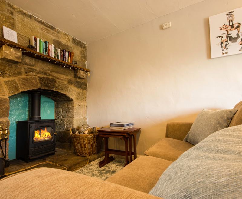 A delightful ground-floor cottage, containing an open plan living/dining and kitchen area with a log burning stove being a delectable addition.  The double bedroom has an arched opening through to a separate dressing area. 

The outdoor seating area enjoys a quaint spot opposite the cottage with wide-ranging views towards Lathkill Dale.  Shippon is ideal for a couple or couple with a baby looking for a cosy, comfortable cottage.  

Occupancy: Maximum 2 adults + 1 cot
Dogs: Up to 2 small dogs or 1 large dog (to be used as a guide only – please contact us regarding individual requirements)