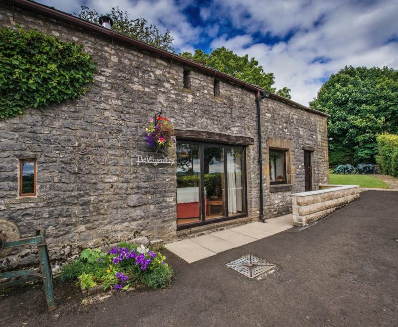 This spacious two-bedroomed stone built cottage offers delightful views over fields and the landscaped grounds.
It has a wonderfully cosy farmhouse feel, and its natural lighting gives it a real sense of peace.
We are confident that this cottage will meet your expectation of the ideal cottage in the country.
The light and airy master bedroom with its double bed has a full length window overlooking the garden.