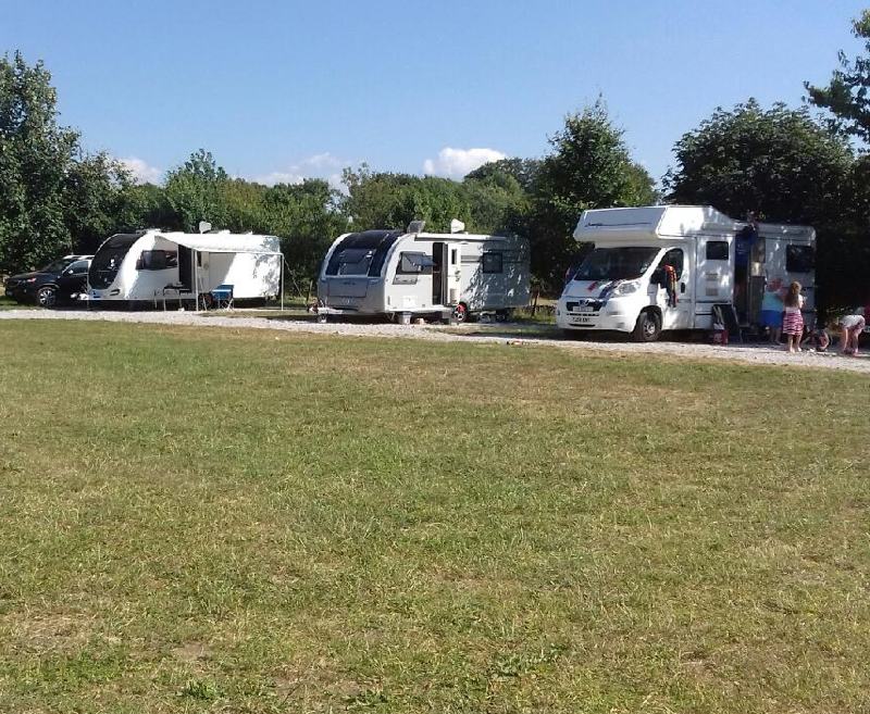 A small secluded Caravan Park with glorious views of Ingleborough and the surrounding countryside with 14 Hard Standing Pitches. All Pitches have Electric Hook Up, Freshwater Tap and Grey Waste Water Disposal Point.
NEW Amenity block with Accessible Wetroom
New for 2019 is a stone built amenity building with Accessible Wet Room and WC, Family Wet Room with WC, separate Shower and two additional WC’s.
Outside is a Pot Wash area with local information.
Free WiFi available
[symple_button url=