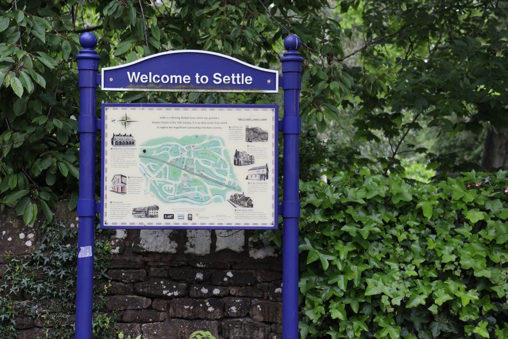 More-to-Settle-settle sign Settle