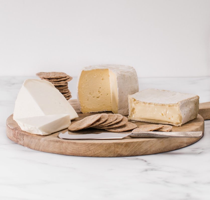 Enjoy our original and most popular award winning cheeses.
Sharpham Brie, which is undoubtedly our flagship cheese. Made by hand, sublimely rich and buttery, developing savoury mushroom notes when ripe made with the milk from our own Jersey herd. At its best an hour or so out of the fridge before serving.
Ticklemore Goats cheese, our stark white cheese is crumbly and delicate with subtle herbaceous hints. Awarded 2 stars by Great Taste in 2020 and also excellent to cook with.
Sharpham Rustic, our semi-hard cheese with a refreshing light tang that delicately balances the richness of the jersey cows milk.
This selection contains approximately 1.2kg's of cheese accompanied by Sourdough Crispbreads from Peters Yard.