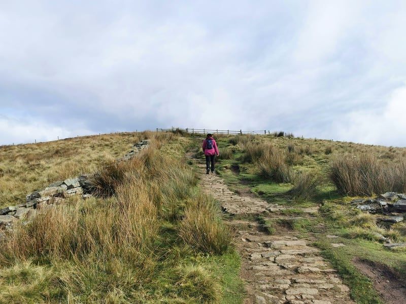 Walking uphill for fitness.